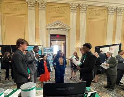 students from battery drop presenting product to us congresswoman emilia sykes
